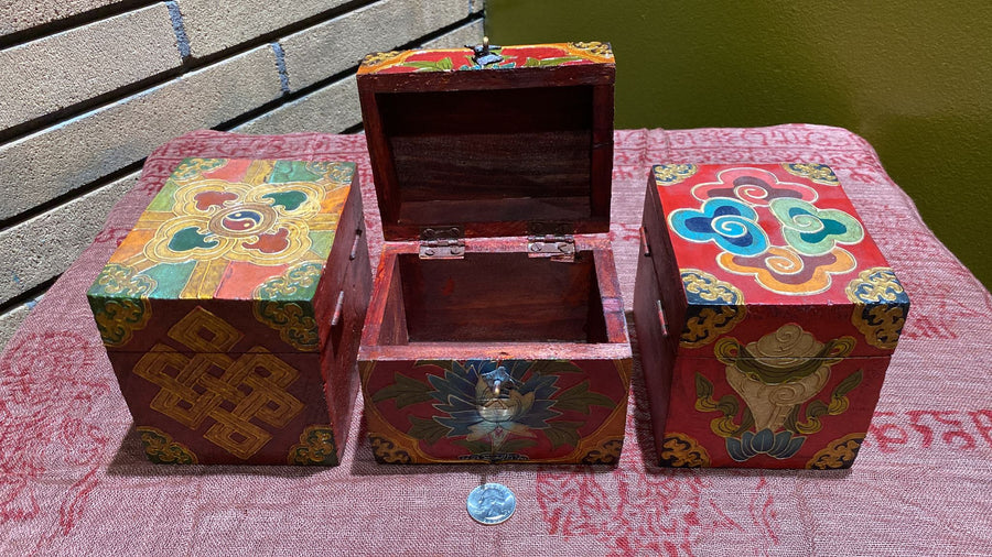 painted wooden chests