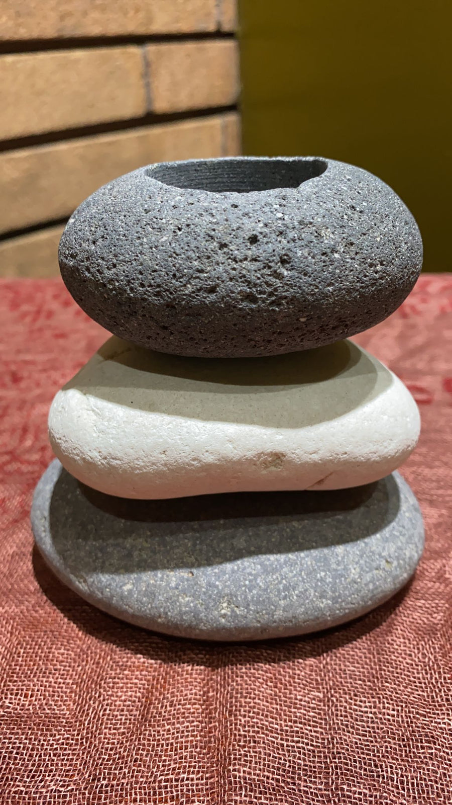 river pebbles candle holder