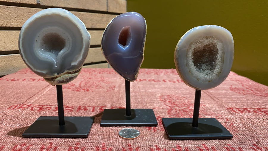 brazilian agate geode on a metal stand